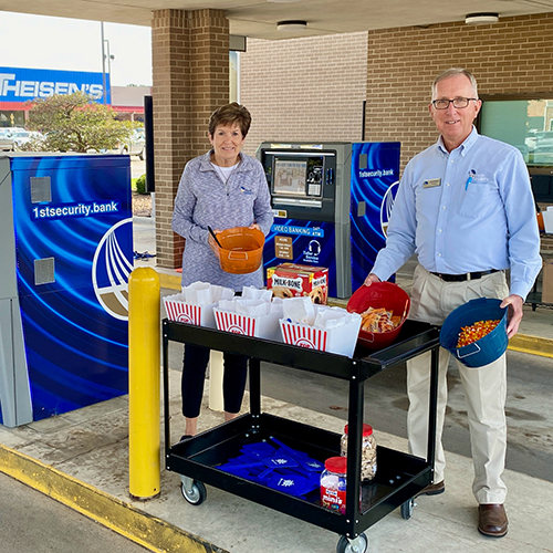 Annie and Charlie welcoming customers in our drive up.