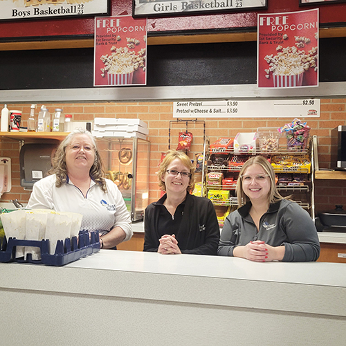 Helping at the school concession stand.