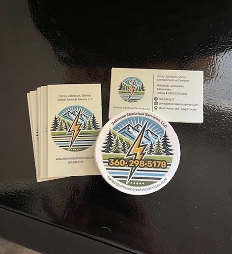 Johnson Electrical Services business cards and company branding representing trusted electrical contractors serving Skagit County and Whidbey Island.