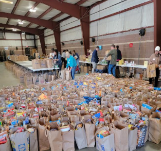 Collecting all the bags from our generous donors for Thanksgiving