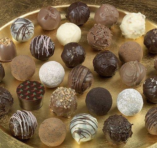 Hand Finished Truffles made with the finest pure cocoa butter chocolates, fresh dairy cream, sweet butter and natural flavors.