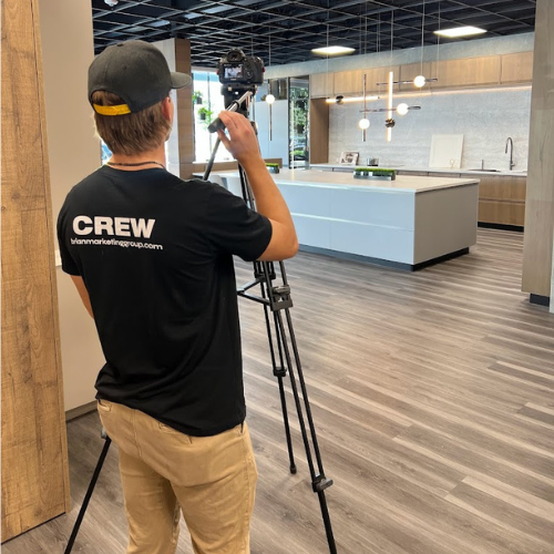 Capturing Your Vision: Our team member at work, bringing your showroom to life through the lens.