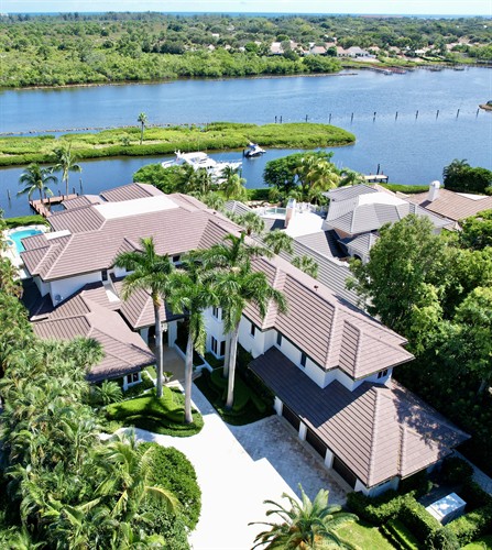 New flat tile roof in the pristine gated community of Admiral's Cove in Jupiter, Florida New flat tile roof in the pristine gated community of Admiral's Cove in Jupiter, Florida