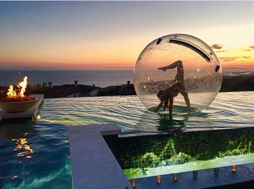 Gallery Image Aqua_Shere_bubble_girl_infinity_pool_party_event_planner.jpg