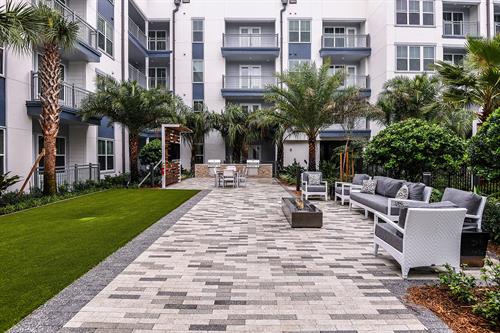Enjoy the Courtyard with Grills and a Fire Pit