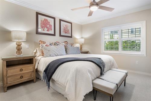 bedroom with coral art