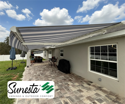 Sunesta retractable awning providing shade on paver patio