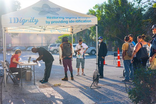 An IDignity team member checks clients in at our service location in downtown Orlando. 