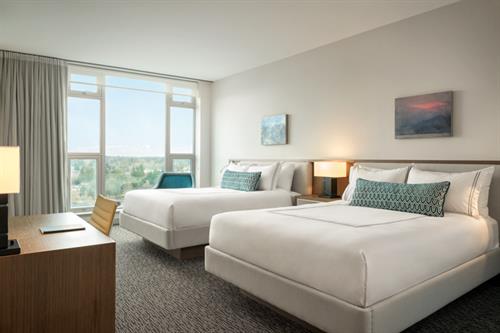 Guest room - two queen beds with sweeping views of the city and mountains Guest room - two queen beds with sweeping views of the city and mountains