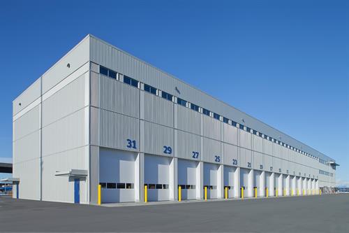 Delta Port project highlighting a mix of our XM900W, SM600W, SM7/8 Corrugated and SM305 cladding profiles