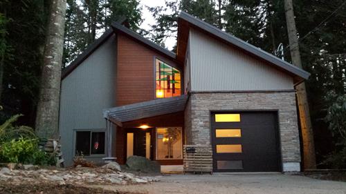 SM 7/8 Corrugated offers a sleek finish to this modern home SM 7/8 Corrugated offers a sleek finish to this modern home