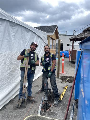 PAC Bridge crew working on a solid cedar wood fence at a charitable organization in Surrey.