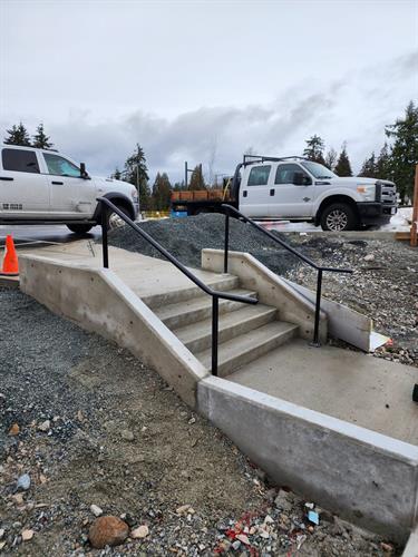Welded black handrails at Centennial Secondary School, Coquitlam.