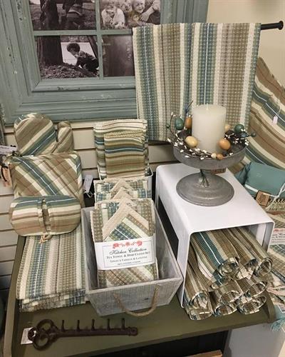 We carry a wide variety of placemats, tea towels, runners and tablecloths. 