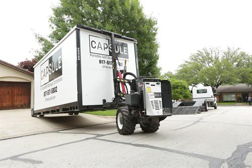 Our remote machine can place it in tight spots with out dmaging a driveway. 