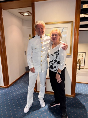 Karen Dawson with Captain Lund of SeaDream 1 - It’s Yachting, Not Cruising