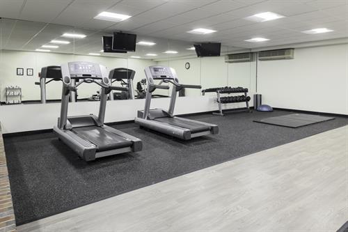 Keep up with your workout routine in our extensive fitness center. 