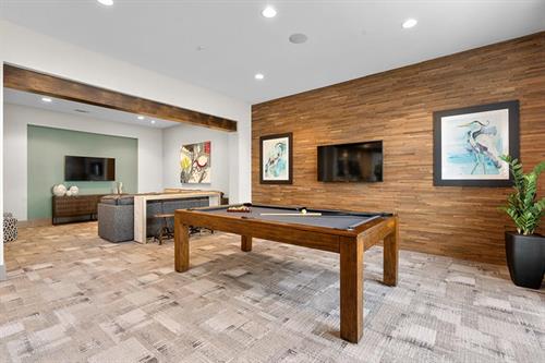 Enjoy a game of pool in our relaxing, modern clubhouse! 