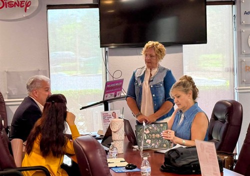 Melanie Miller teaching business owners practical ways to use AI for marketing and everyday tasks at The Osceola Chamber’s Growth Series.
