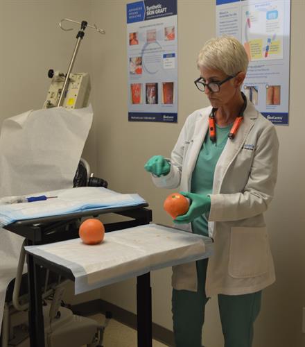 One of our best providers, Monique Consoer, APRN, ANP-C, CWS®, demonstrates advanced wound treatments.