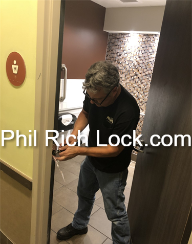 Surprise Visitors In Restaurant Bathroom! - No Privacy!!! Problem: Bathroom door will not stay locked, people walking in unexpectedly. Solution: Adjust the door hinges so the door is properly aligned and slightly modify the strike plate to accept the lock latch bolt. Now customers can go in privacy!