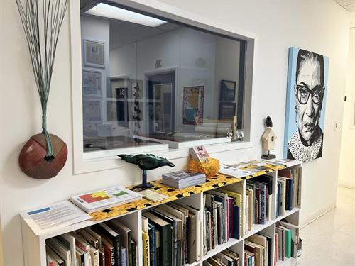 Library with mixed media works by local and national artists