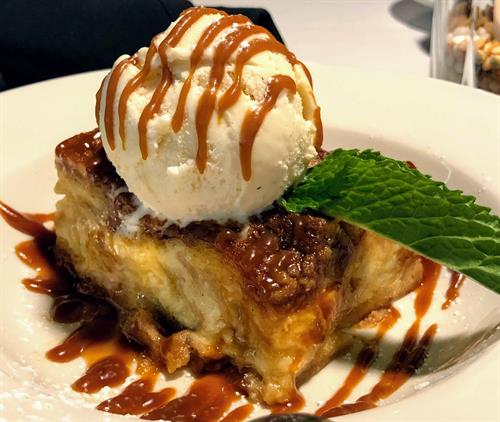 One of our homemade desserts, Croissant Bread Pudding w/ Caramel & Vanilla Ice Cream