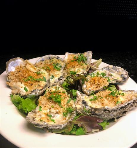 Our local baked oysters w/ Spinach, Cream & Parmesan Cheese