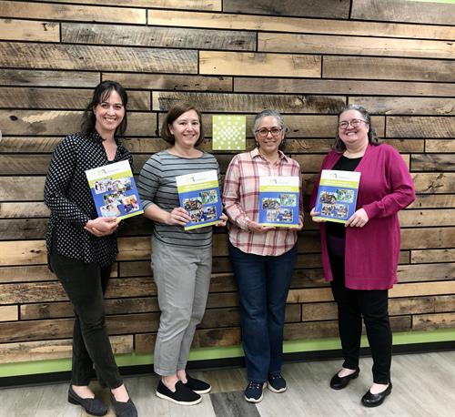 Nonprofit Montgomery Staff Hold the First Copy of the 2025 State of Nonprofits in Montgomery County Report