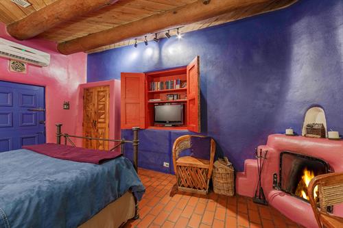 Puerta Azul is one of our most intimate rooms in the historic 1832 part of the Inn