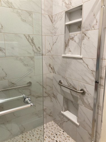 New stand up tile shower in place of a sitting tub.