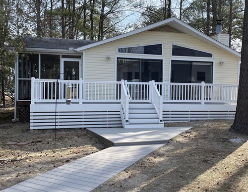 This repeat customer had us rebuild her deck and walkway to the water. So pretty!