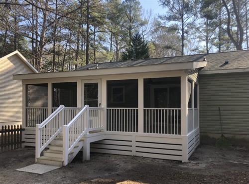 A screen porch addition complete with electrical. Perfect for cool, breezy evenings!