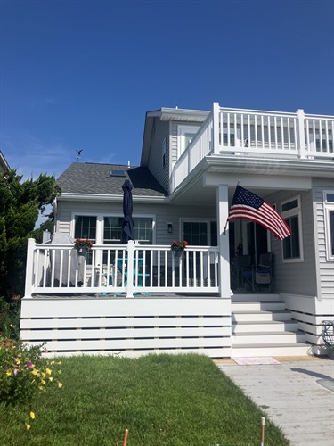 Here we remade the upper and lower decks and created a new sunroom.