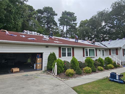 Roof replacement from brown to red in Pocomoke City.
