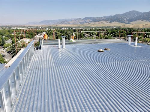 Commercial Metal Roofing on the Kimpton Armory Hotel in Bozeman, MT. 