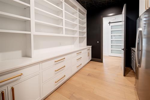 Pantry of Contemporary Haven Custom Home by Otero Signature Homes 2023