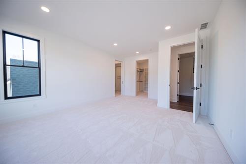 Second Primary Bedroom of Modern Minimalist Custom Home by Otero Signature Homes 2024