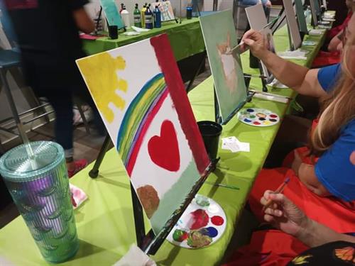 Paint party for 52 newly housed individuals at the new permanent supportive housing unit. 