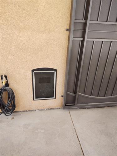 Dog Door installation through Stucco