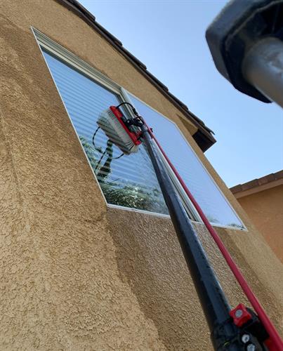 Exterior Window Cleaning using our professional water-fed tools & filtration.