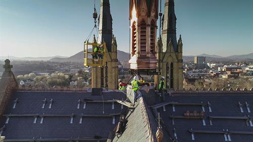 Our crew preparing for the installation of the newly restored copper spire.  Located in Roanoke, VA.