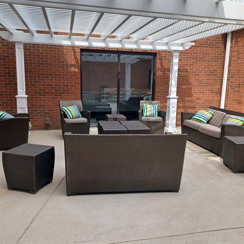 Couches and Chairs on Patio Courtyard (Lights at night)