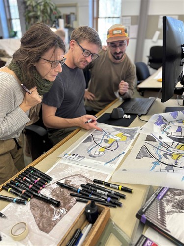 Students collaborating in the studio