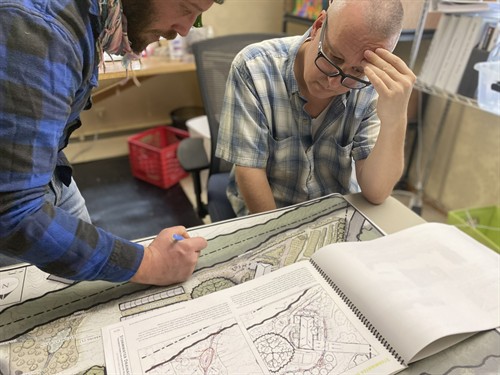 Student presents designs to a client
