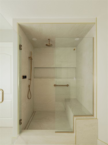 One custom shower in a 3 bathroom renovation that we did in Henderson Estates, Edmonton. Large format tiles, mitered corners, in floor heat - beautiful result. 