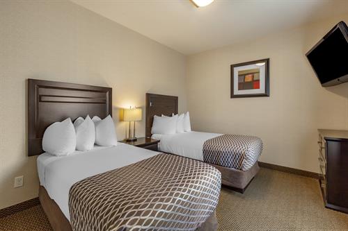 Bring the whole family along and enjoy a separate room with double beds in our family suite.