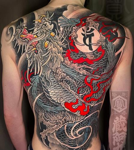 Mathew Clarke Dragon Back Piece tattoo