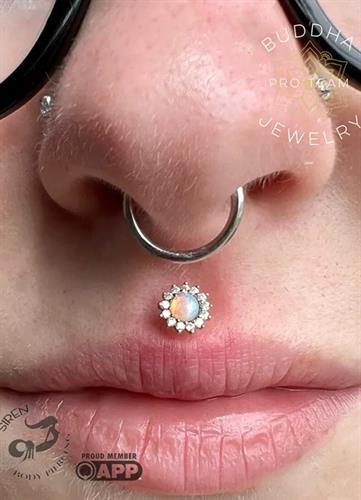 Philtrum and Septum piercings