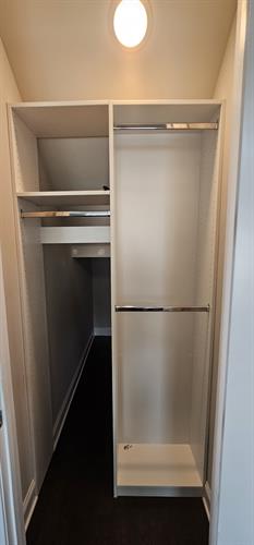 White Under Stair Storage & Coat Closet